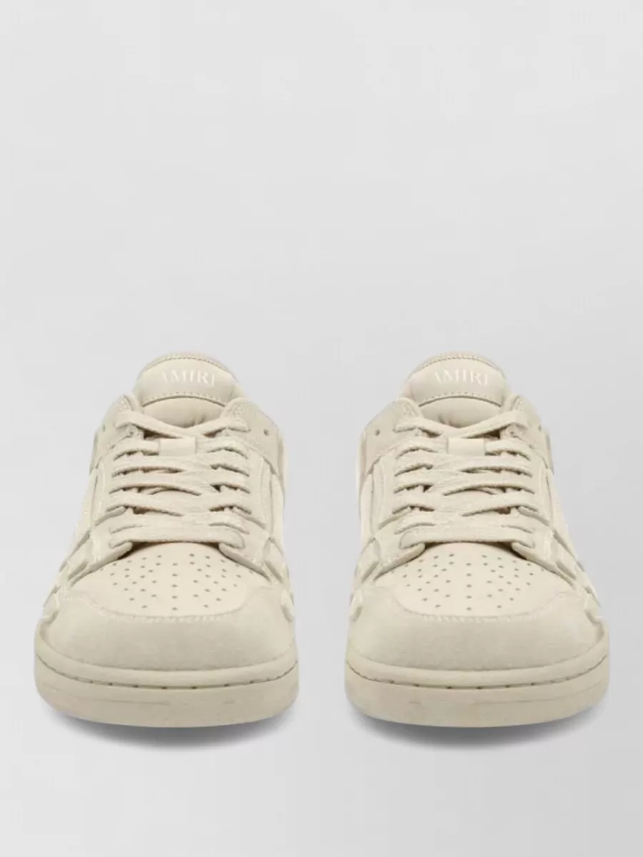 Amiri leather paneled low-top sneakers