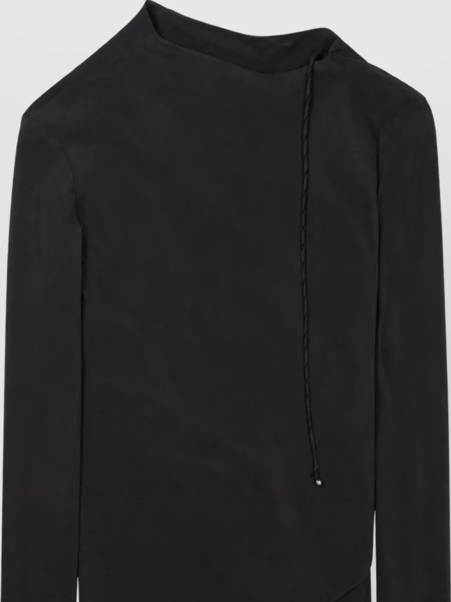 Alysi Silk asymmetric blouse — The soft black asymmetric blouse mirrors the trouser’s quiet minimalism, keeps the palette deep and tailored, and its clean drape sits neatly over a high-waisted wide leg.