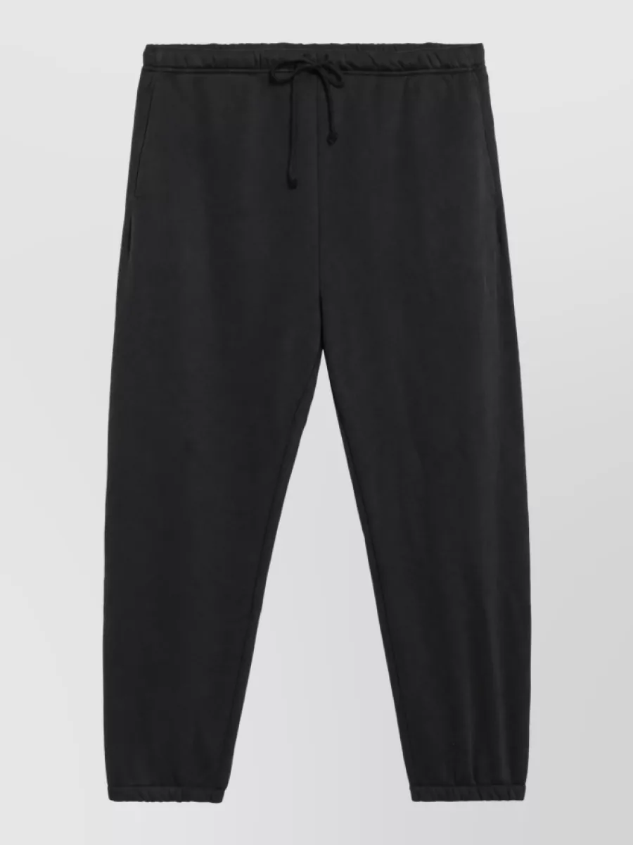 Skims track pants