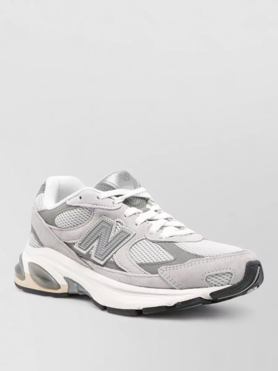 New Balance suede mesh paneled low-top sneakers