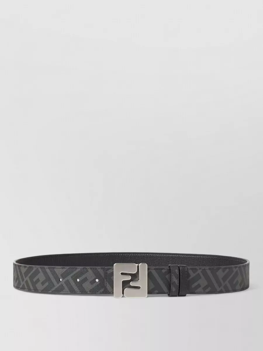 Fendi Calfskin leather reversible belt — The reversible black Fendi belt quietly defines the waist on the high-rise shorts and introduces discreet logo hardware that suits the refined, minimal mood.