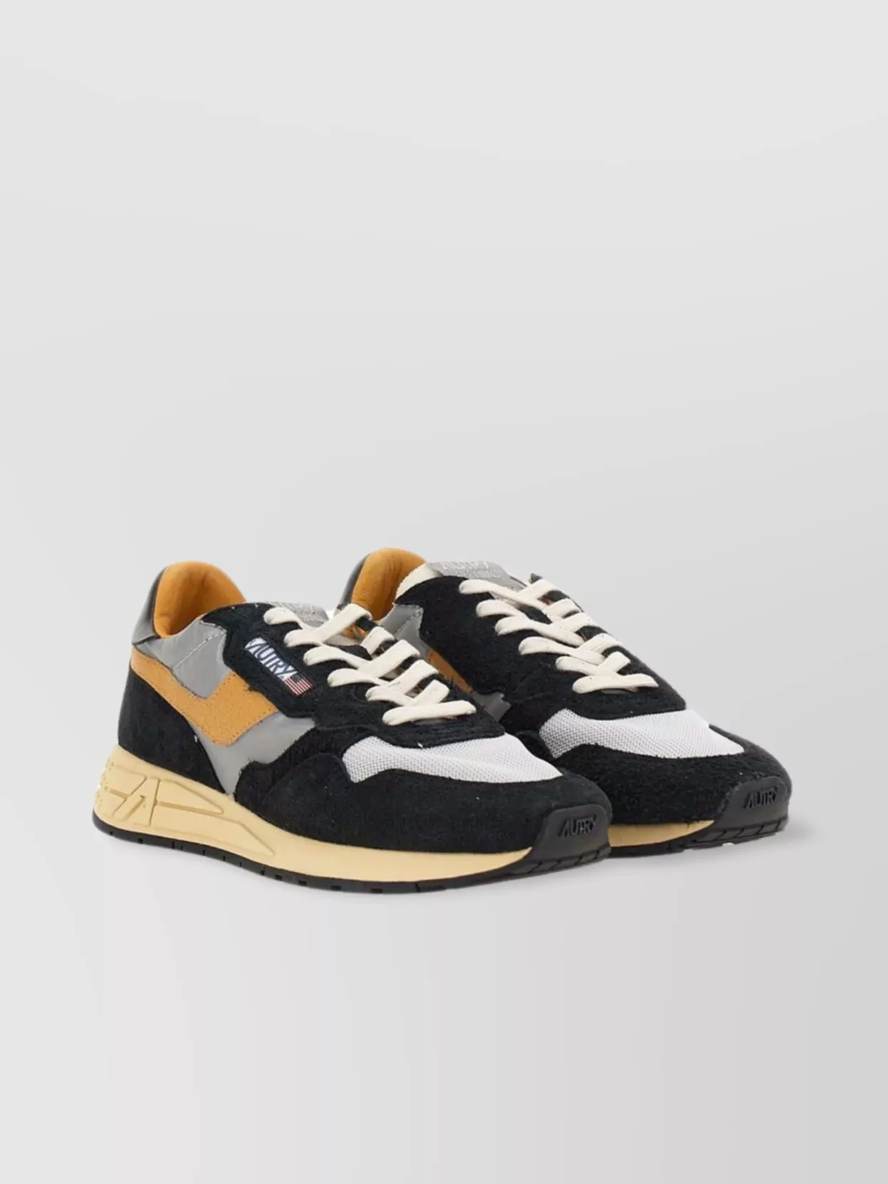 Autry Low Sneaker With Contrast Stitching And Mesh Panels