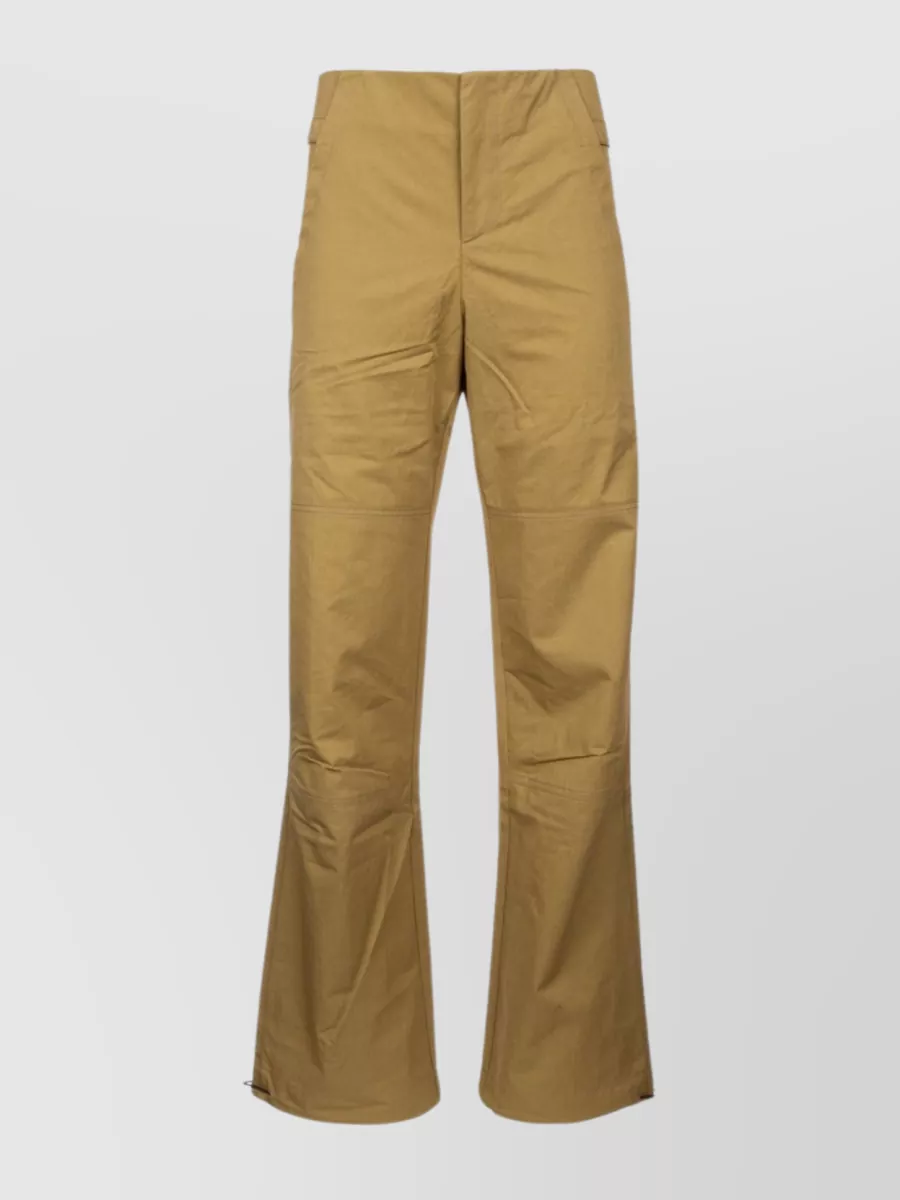 Shop Yuzefi Flared Hem Trousers With Front And Back Pockets In Brown