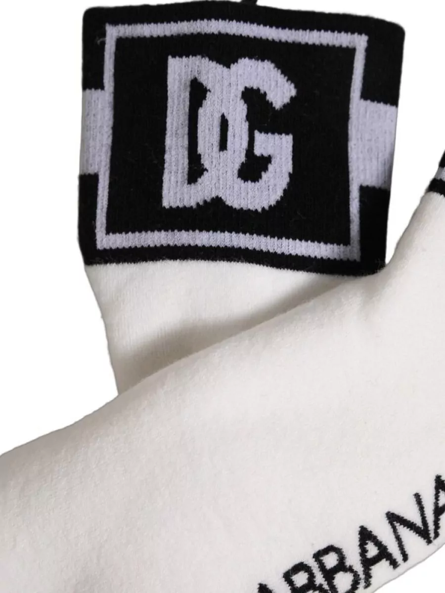 Dolce&Gabbana Cotton logo ankle socks — The Dolce&Gabbana monochrome athletic socks subtly echo the legging stripe and add a small branded detail that ties the premium sport narrative together with the sneakers.