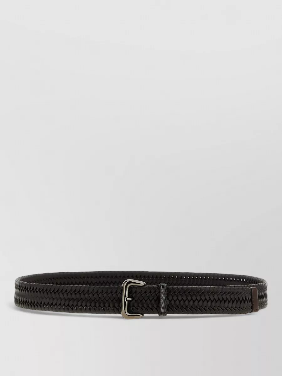 Brunello Cucinelli Leather braided belt — The deep espresso woven belt quietly defines the high waist of the trousers, adding subtle texture and balance between the ivory shirt and grey wool without disrupting the minimalist aesthetic.