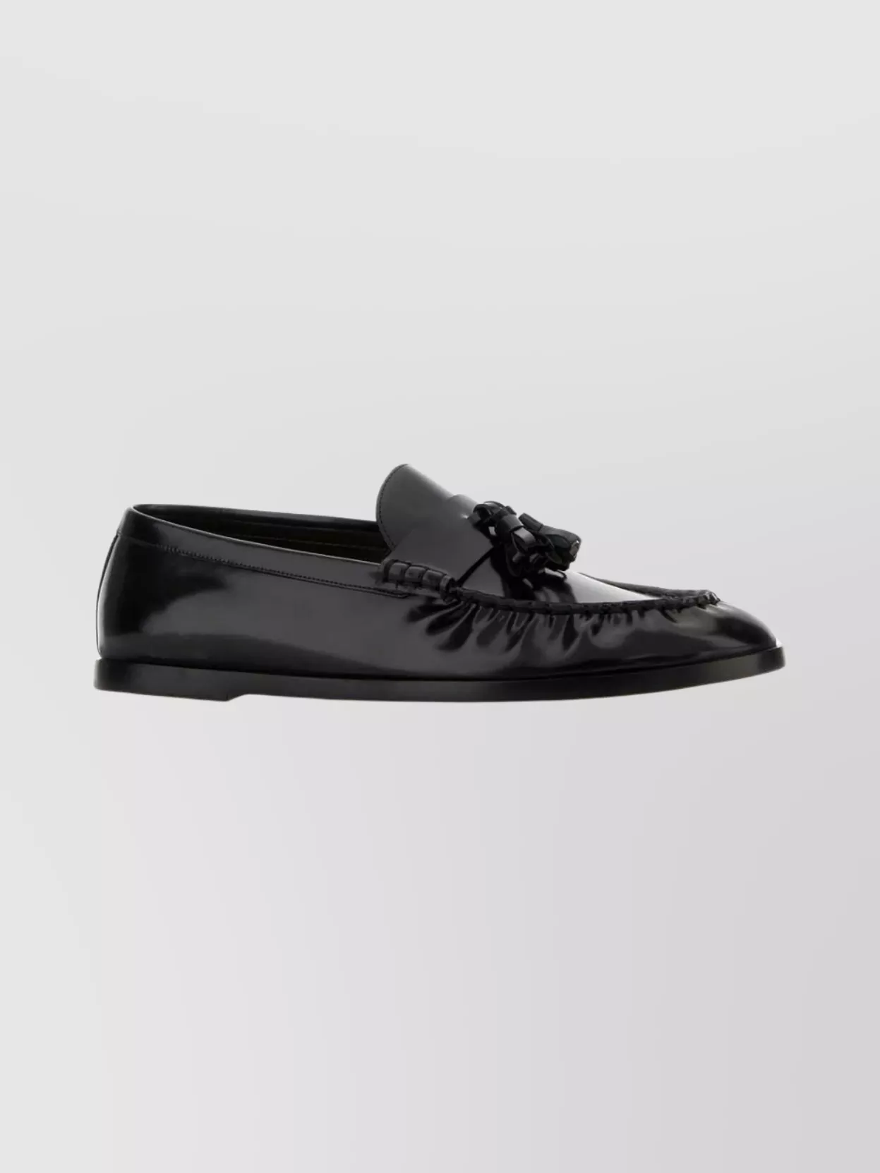 The Row Flat Sole Leather Loafers Featuring Tassel Detail In Black