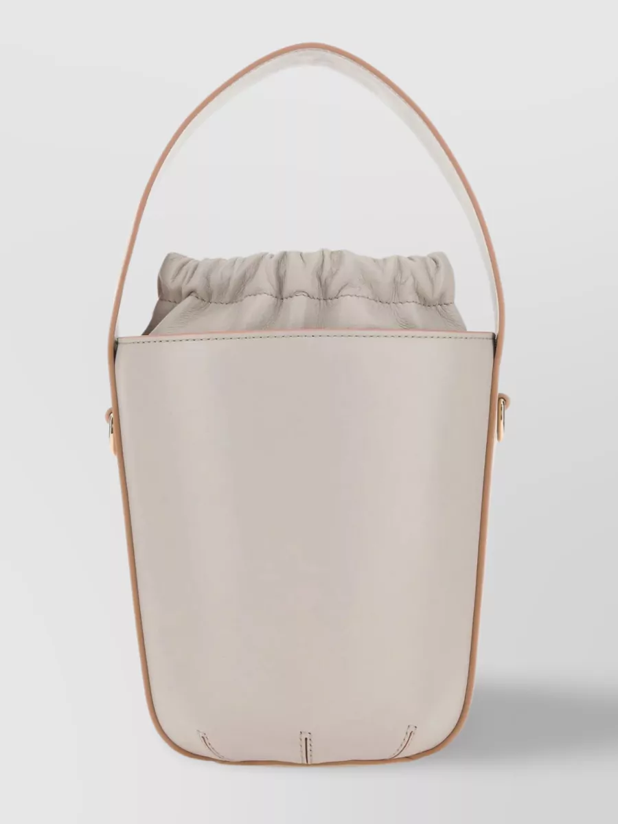 Shop Chloé Structured Leather Bucket Bag In Cream