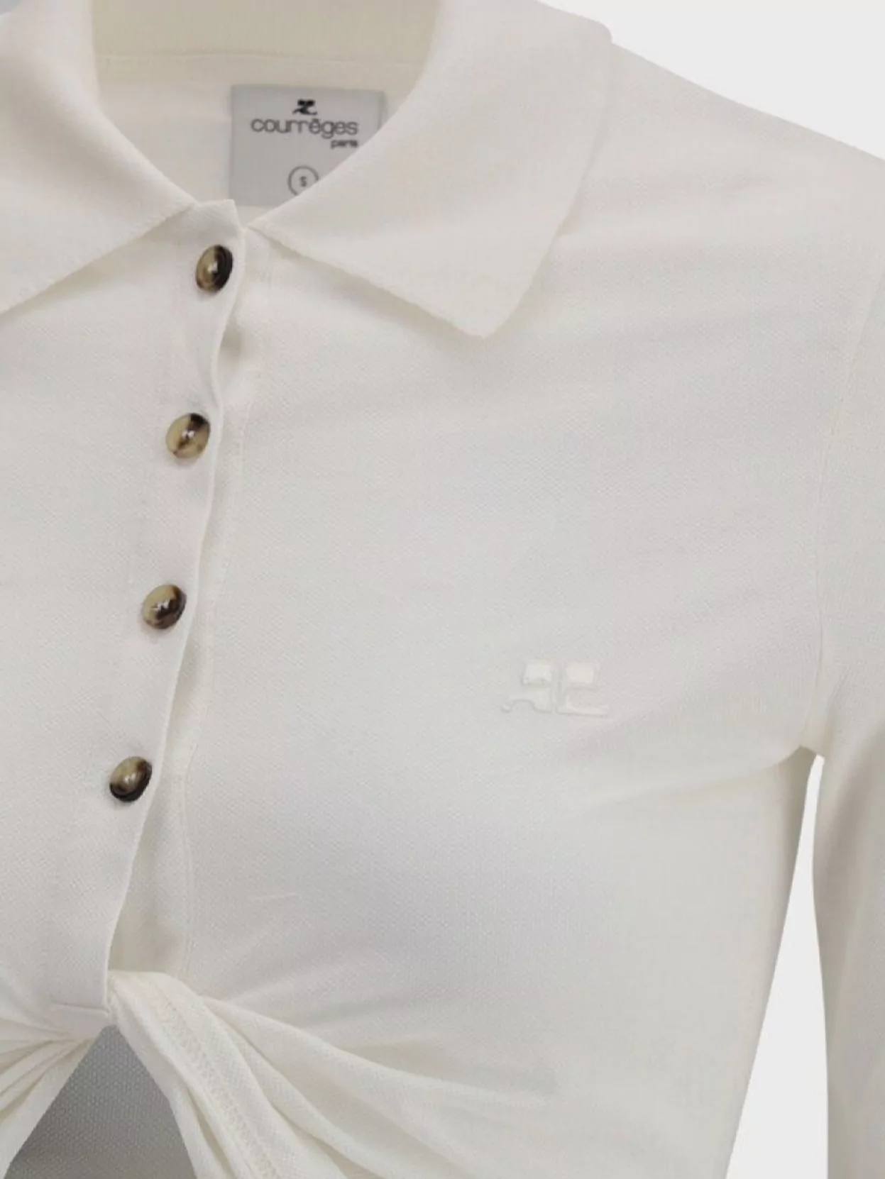 Shop Courrèges Polo With Front Twist Detail