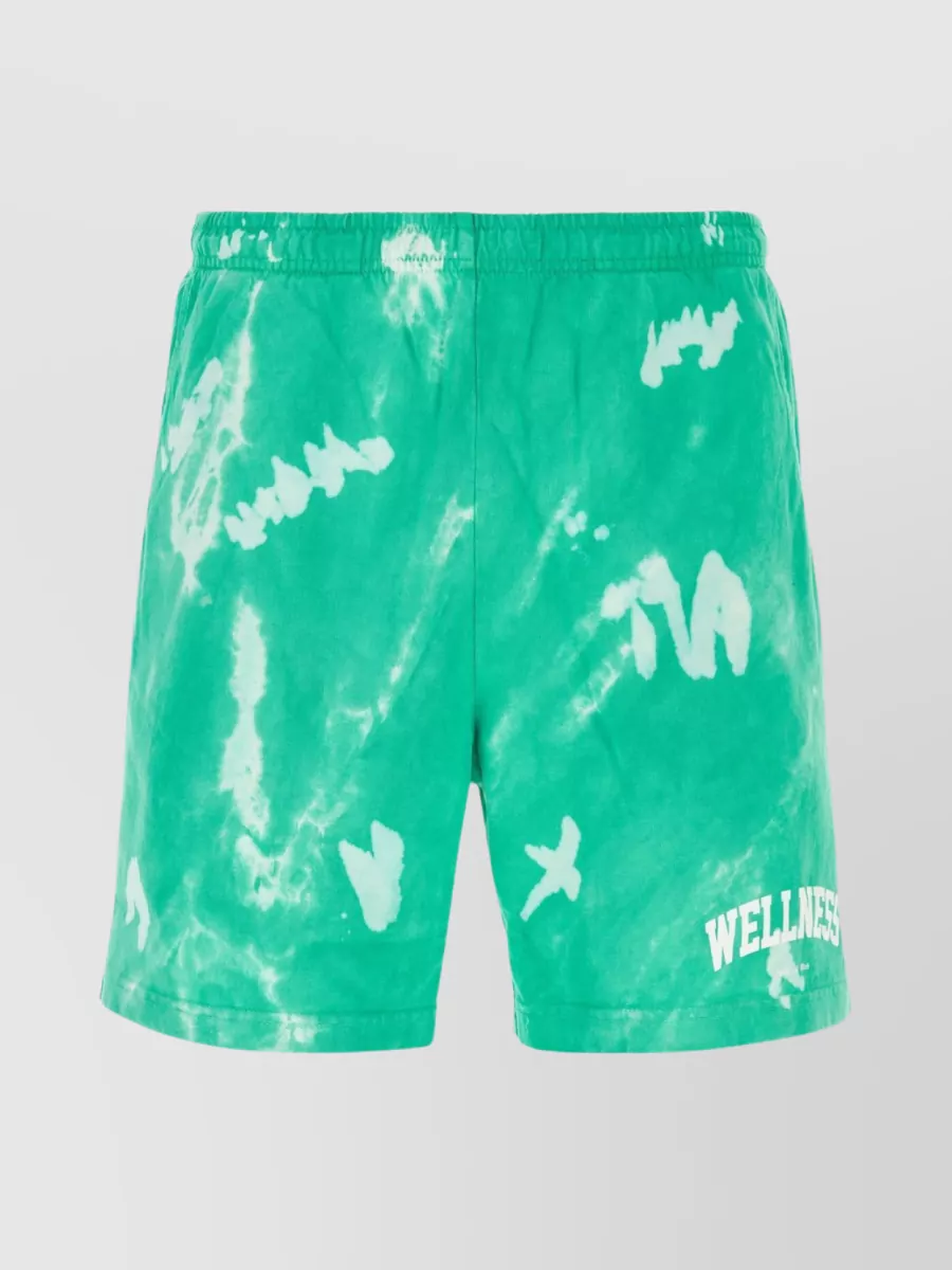 Shop Sporty And Rich Wellness Distressed Cotton Bermuda Shorts In Green