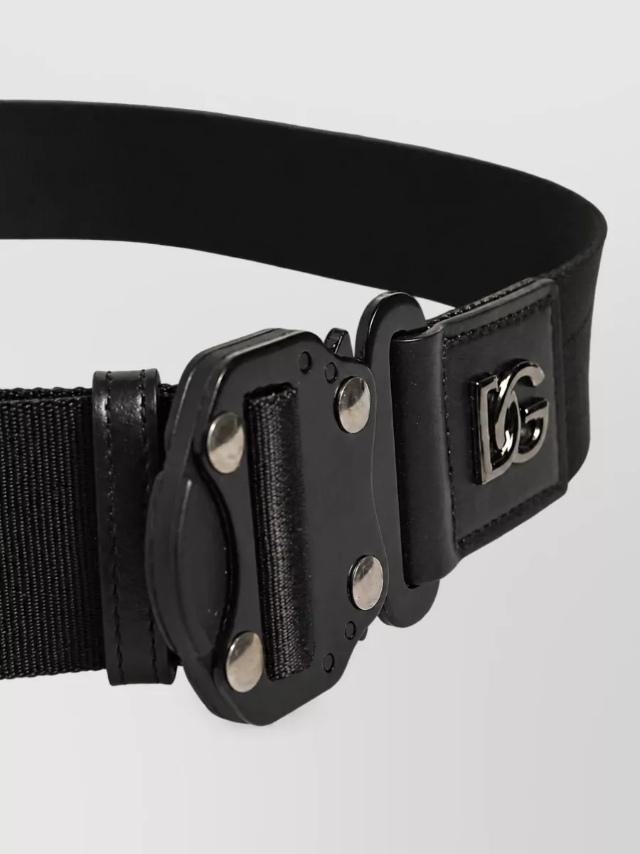 Dolce&Gabbana Fabric belt — The Dolce&Gabbana elastic belt introduces a subtle sport-luxe detail that fits the casual waistband and adds refinement without breaking the minimalist, athletic mood.
