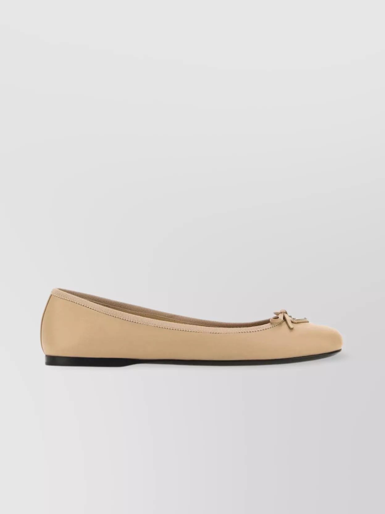 Shop Prada Nappa Leather Ballet Flats Featuring Bow In Beige