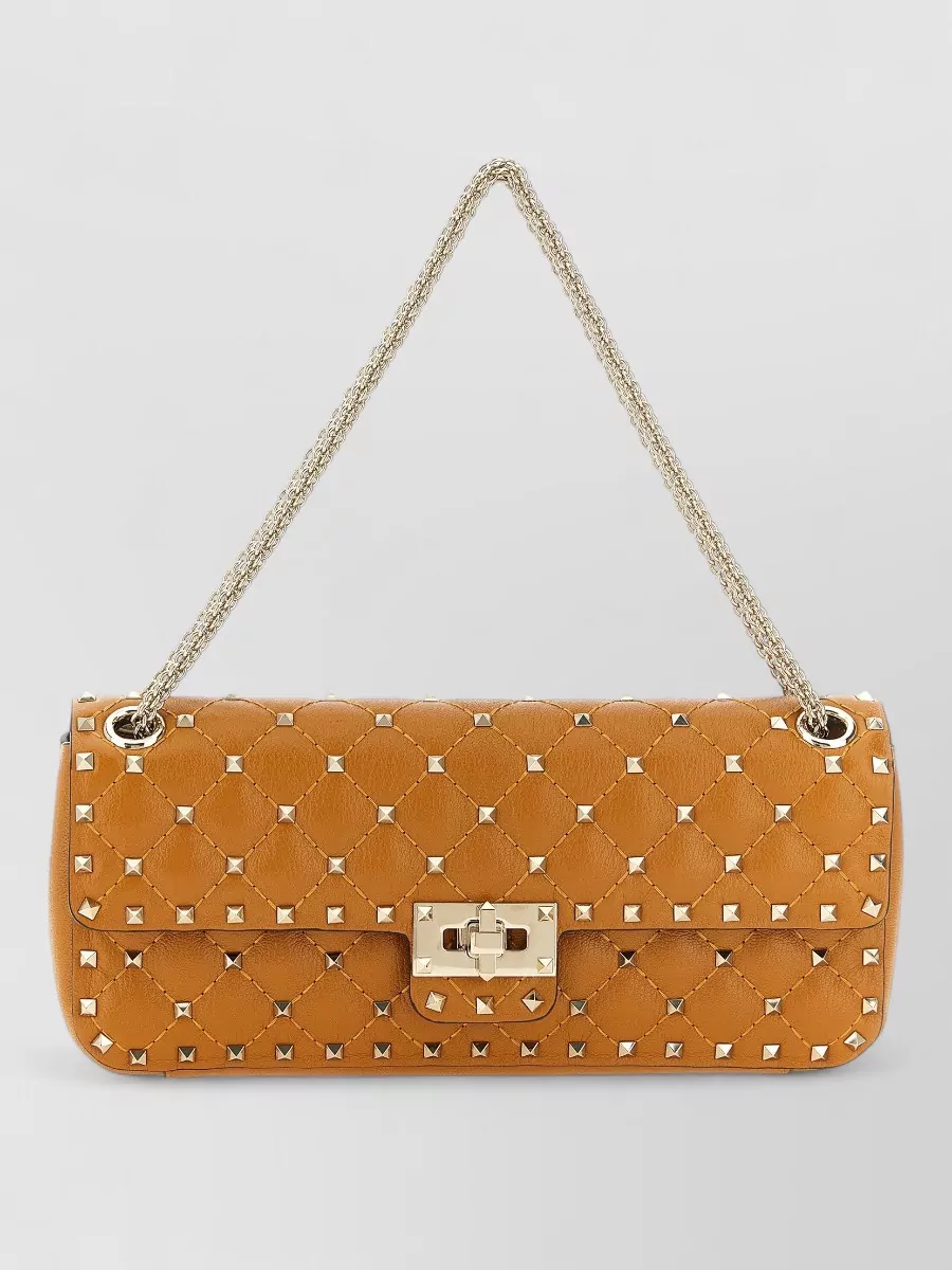 Valentino Garavani rockstud spike medium leather clutch bag