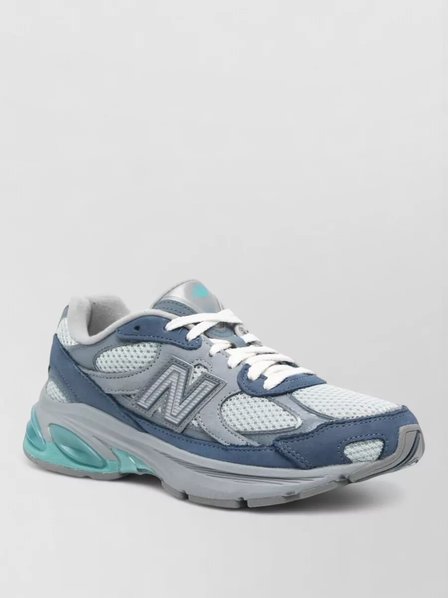 New Balance paneled low-top sneakers