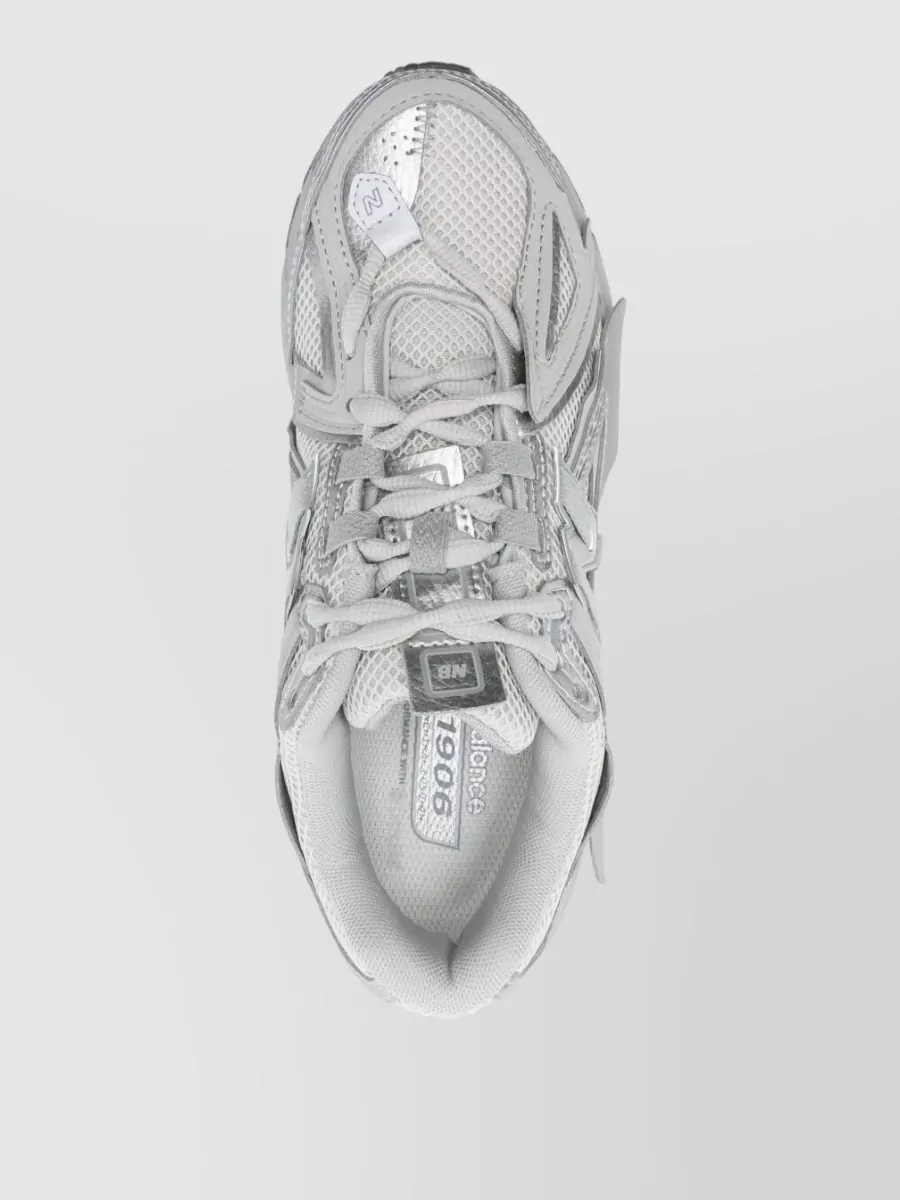 New Balance Paneled Low-Top Sneakers