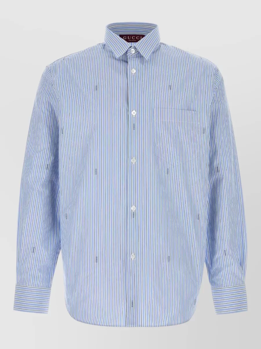 Gucci Striped cotton poplin regular-fit shirt — The navy GG single-breasted blazer creates a seamless, quietly luxurious suit with the matching Gucci trouser, keeping the look formal, tonal and impeccably sharp for SS evenings and boardroom wear.