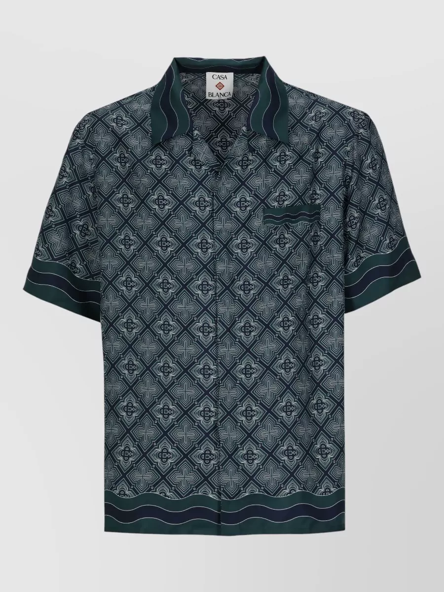Casablanca Silk printed short-sleeve shirt — The varsity-stripe Casablanca shirt in off white, navy and forest green echoes the short’s exact palette and sport-preppy mood, creating a cohesive, relaxed resort set that still feels polished.