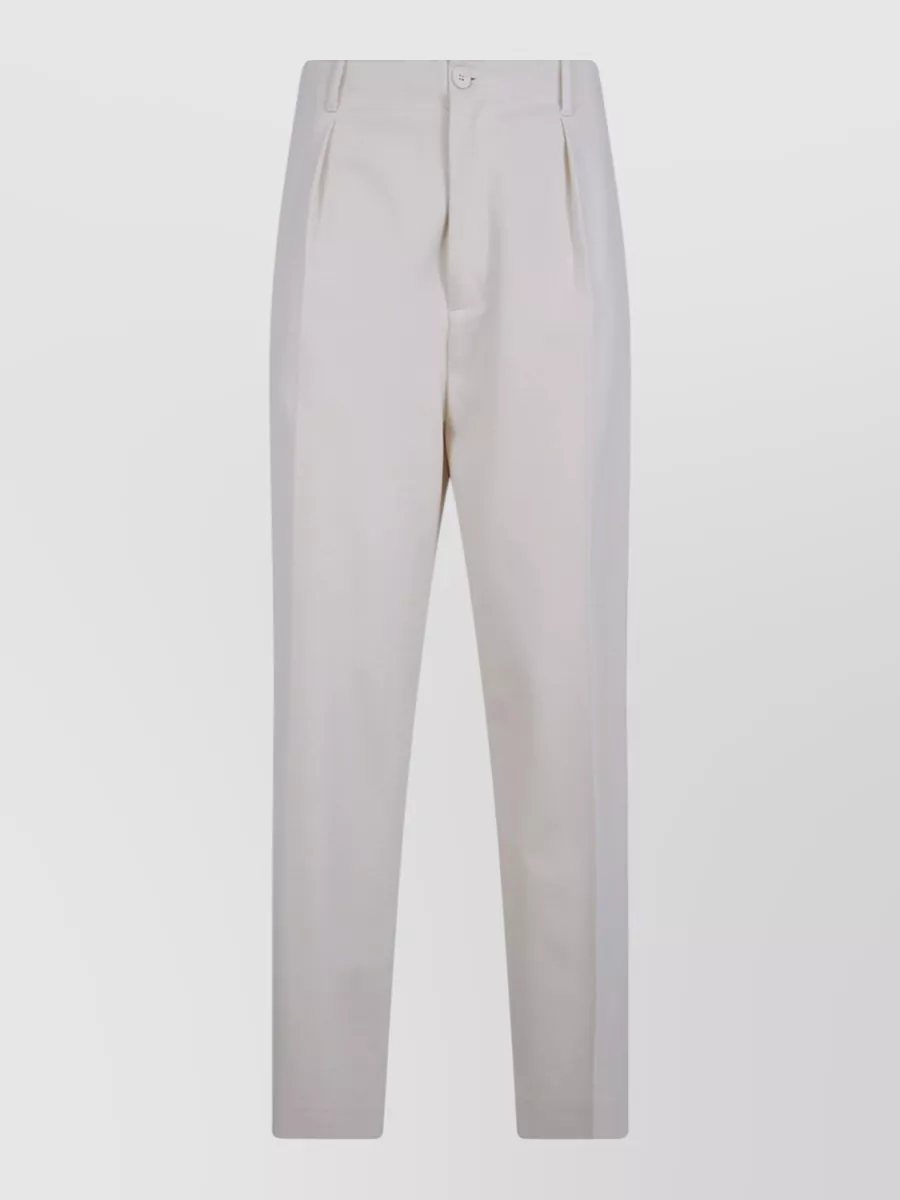 Semicouture Viscose wide-leg tailored trousers — The S Max Mara slim tailored ankle trouser in warm cream mirrors the polo’s buttercream tone and quiet-luxury minimalism, creating a clean, elongated column that keeps the knit feeling polished rather than loungewear.