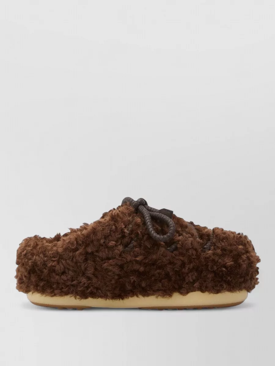 Moon Boot shearling mules