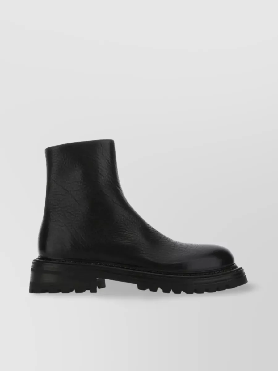 Shop Marsèll Pebble Leather Ankle Boots With Oversize Sole In Black