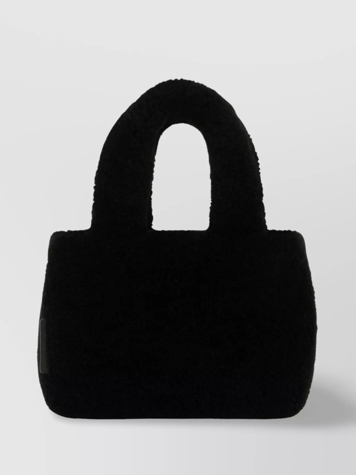 Shop Amina Muaddi Shearling Handbag With Twin Handles And Structured Silhouette