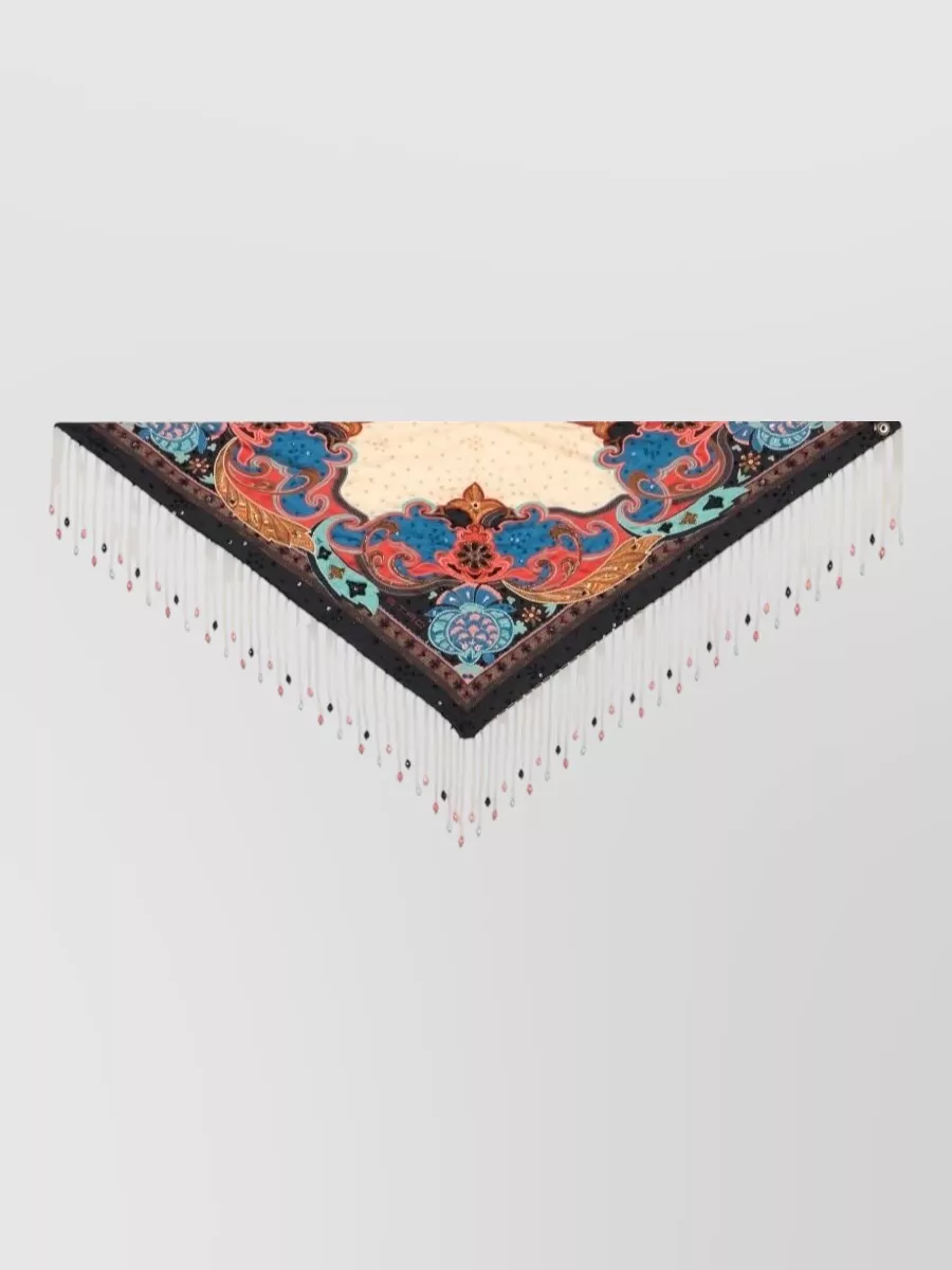Etro Silk printed embellished triangular scarf — The Etro triangular fringed shawl picks up the teal blue and cream from the bikini, adding a dramatic yet soft layer you can drape over shoulders or use as an extra beach wrap.