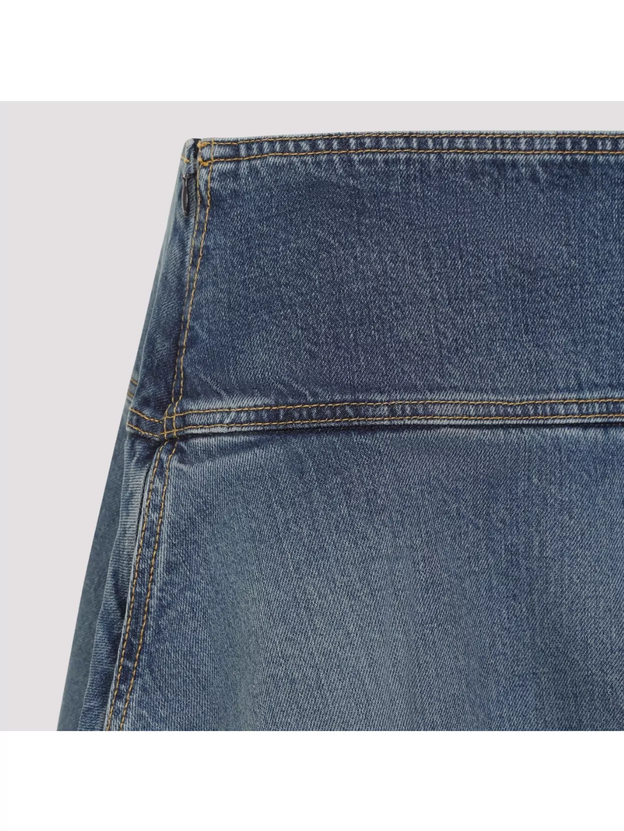ALAÏA HIGH WAIST ASYMMETRIC RAW EDGE DENIM SKIRT