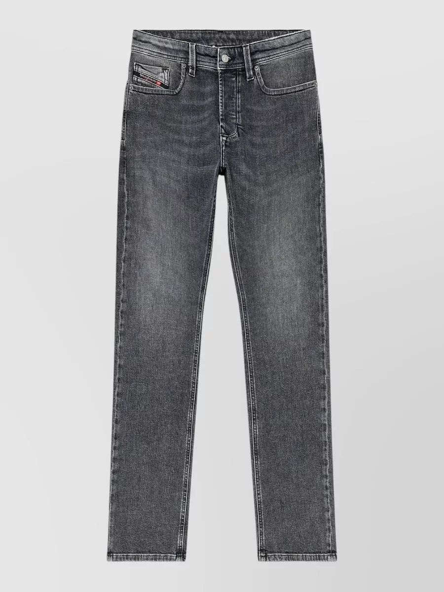 Diesel Straight-leg denim jeans — Charcoal straight-leg denim with subtle abrasion tracks the jacket’s faded black and maintains a clean, regular silhouette that stacks neatly over winter boots.