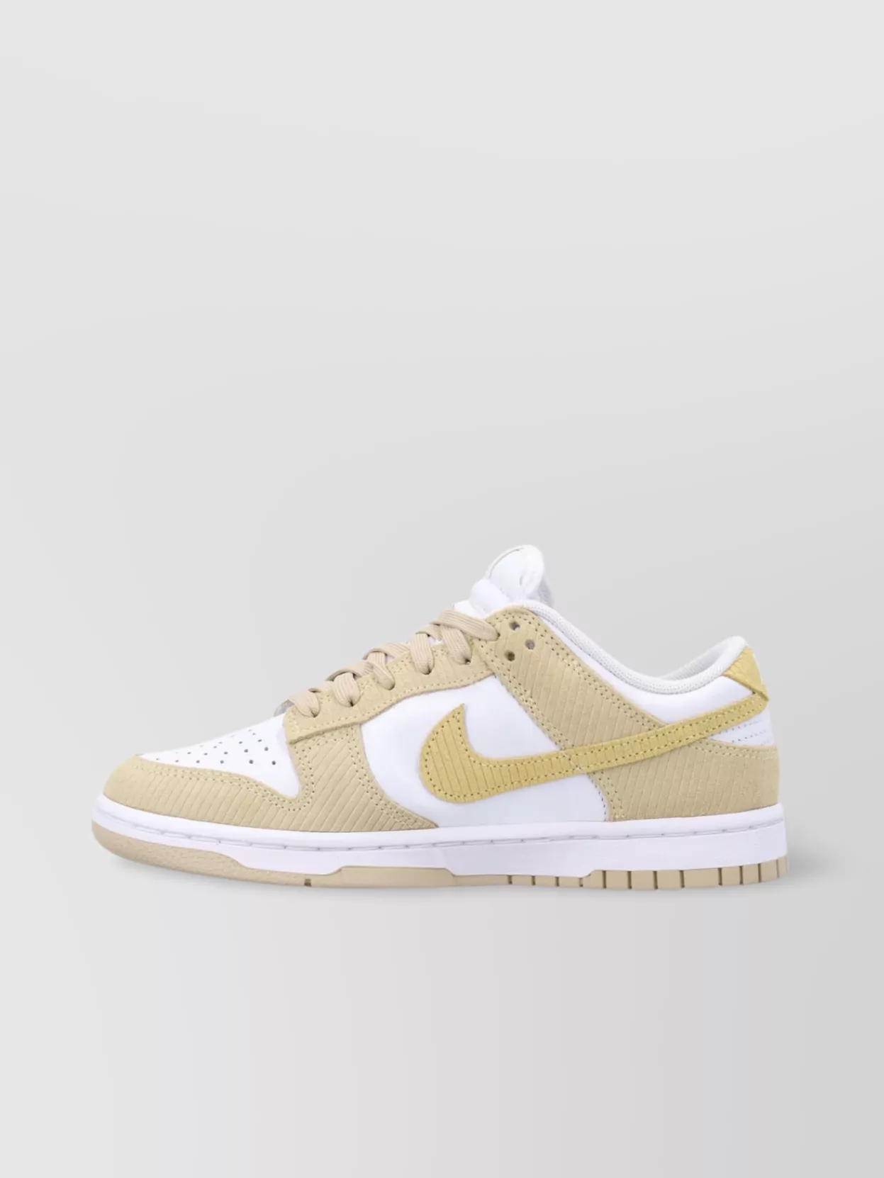 Shop Nike Low Dunk Leather Suede Sneakers