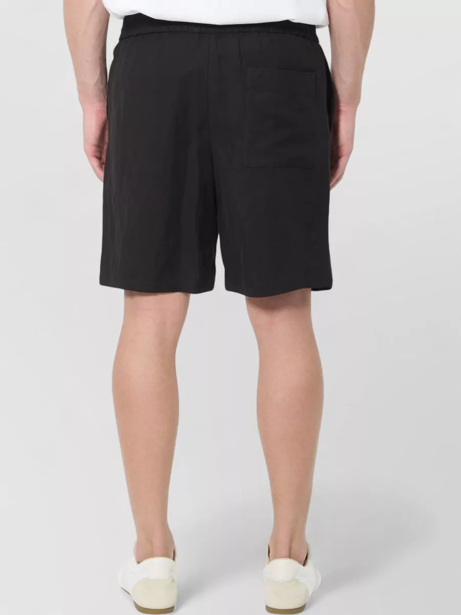 Ami Paris Mid-Rise Wide-Leg Shorts