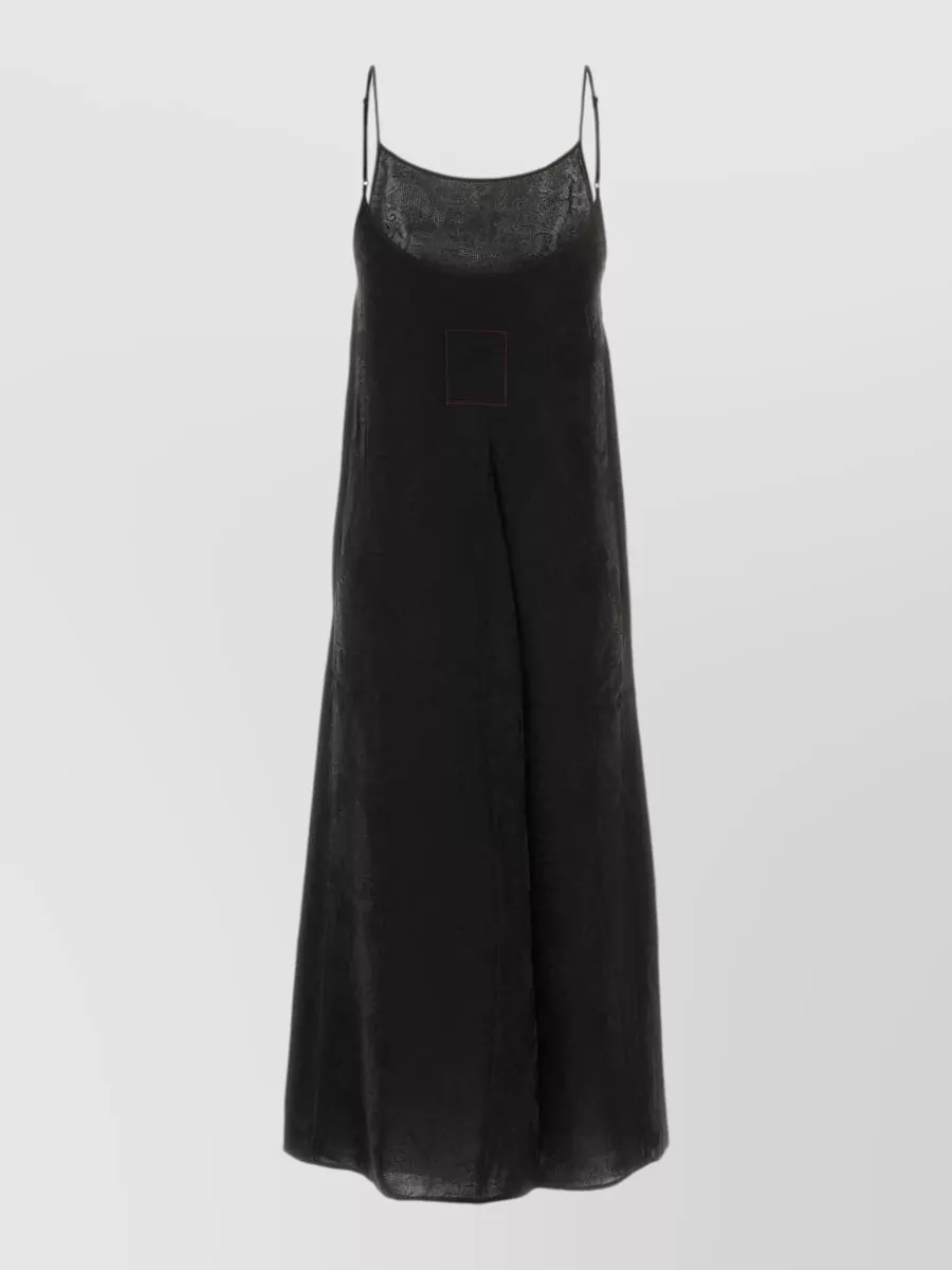 Uma Wang Anaya nightdress — The black Uma Wang slip dress mirrors the robe’s fabric, palette, ease and price tier, creating a tonal inner column that keeps the layering mood serene and lounge-adjacent.