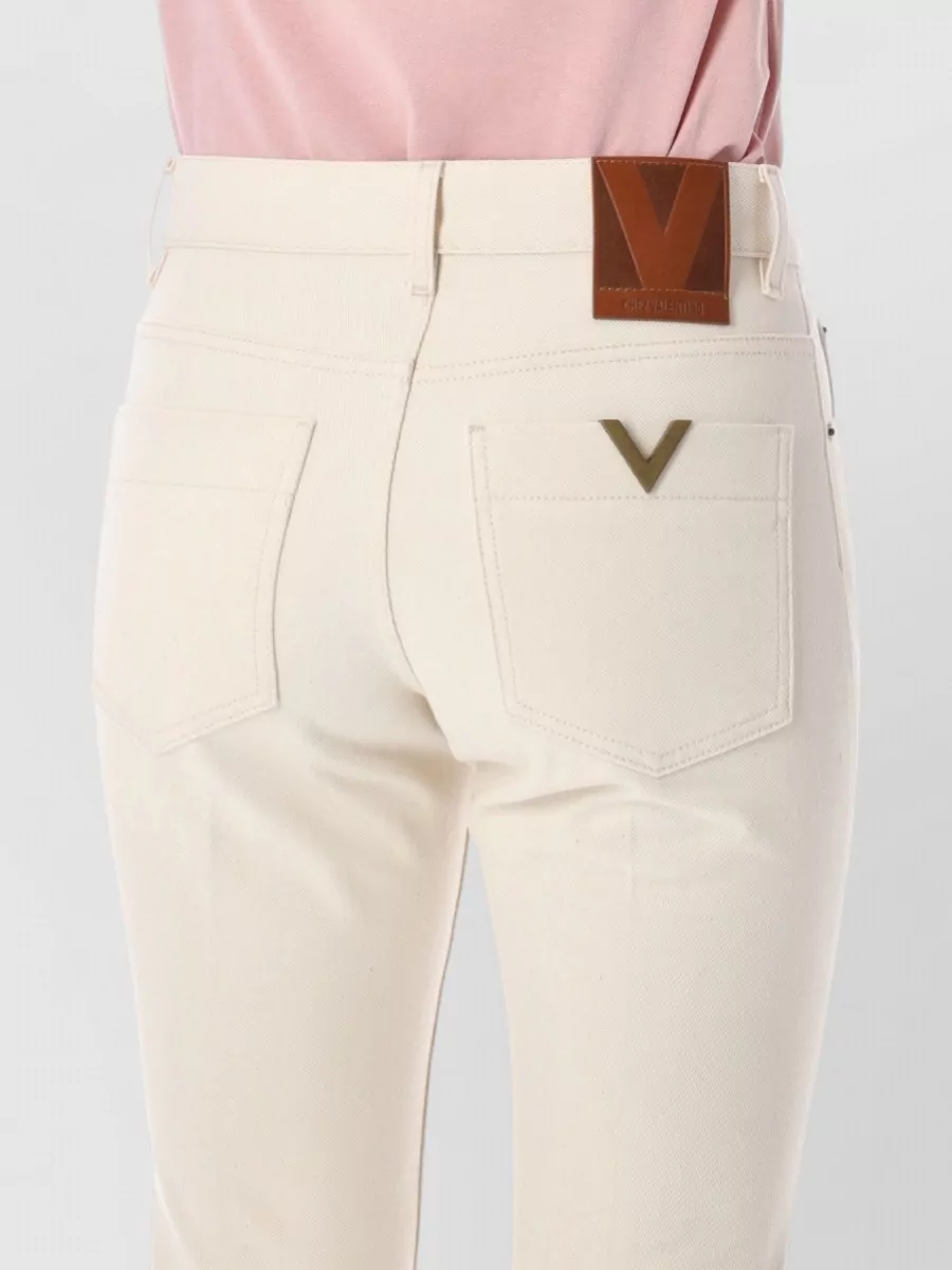Valentino Garavani Denim Regular-Rise Slim-Fit Flared Jeans
