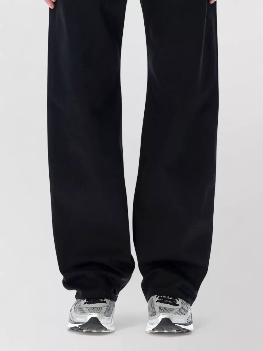 Balenciaga denim mid-rise curved-leg jeans