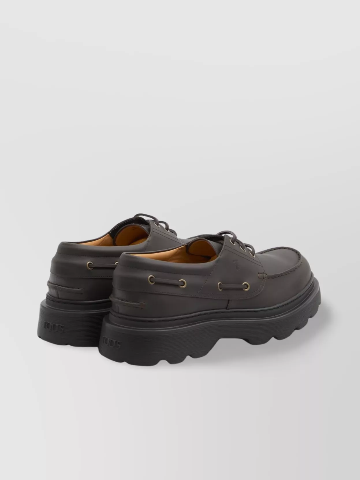 Tod's Boat Shoe With Tank Tread Sole