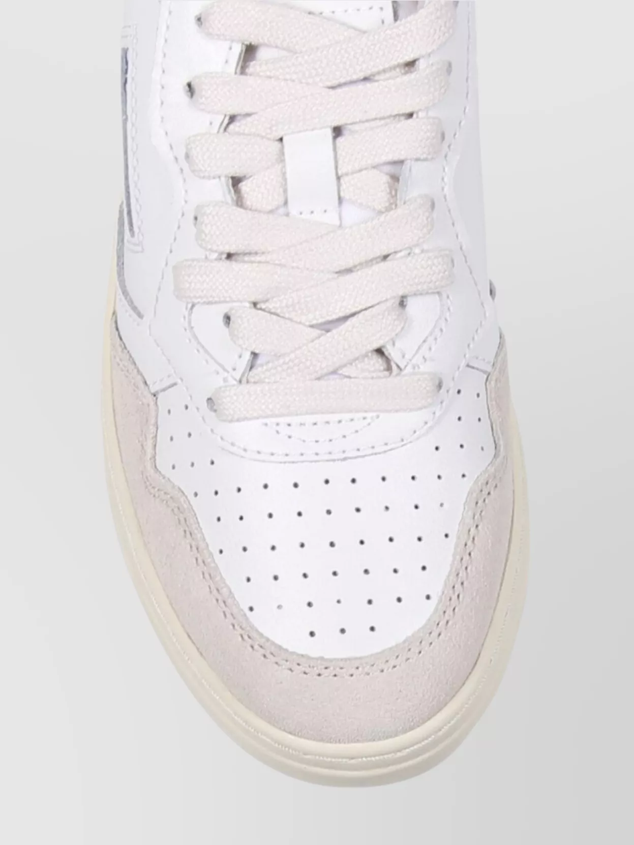 Autry Low Sneaker With Rubber Sole And Perforated Detailing