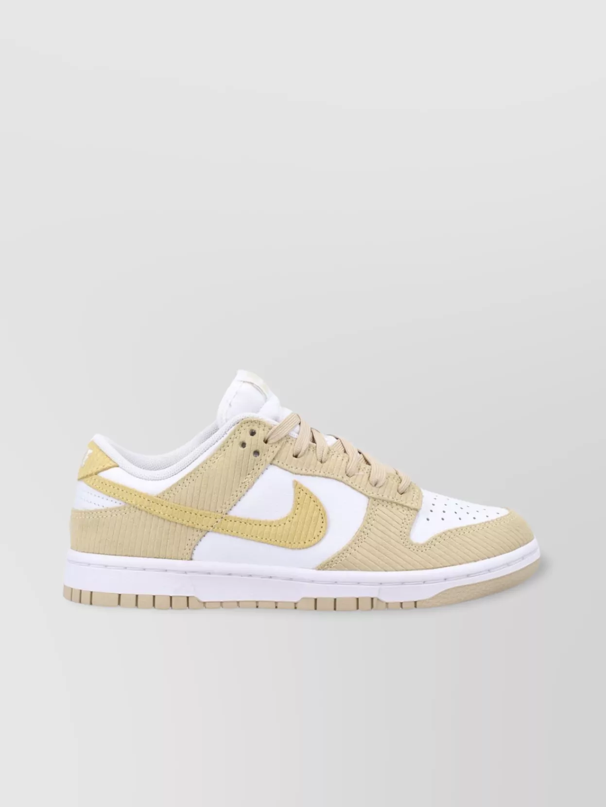 Shop Nike Low Dunk Leather Suede Sneakers