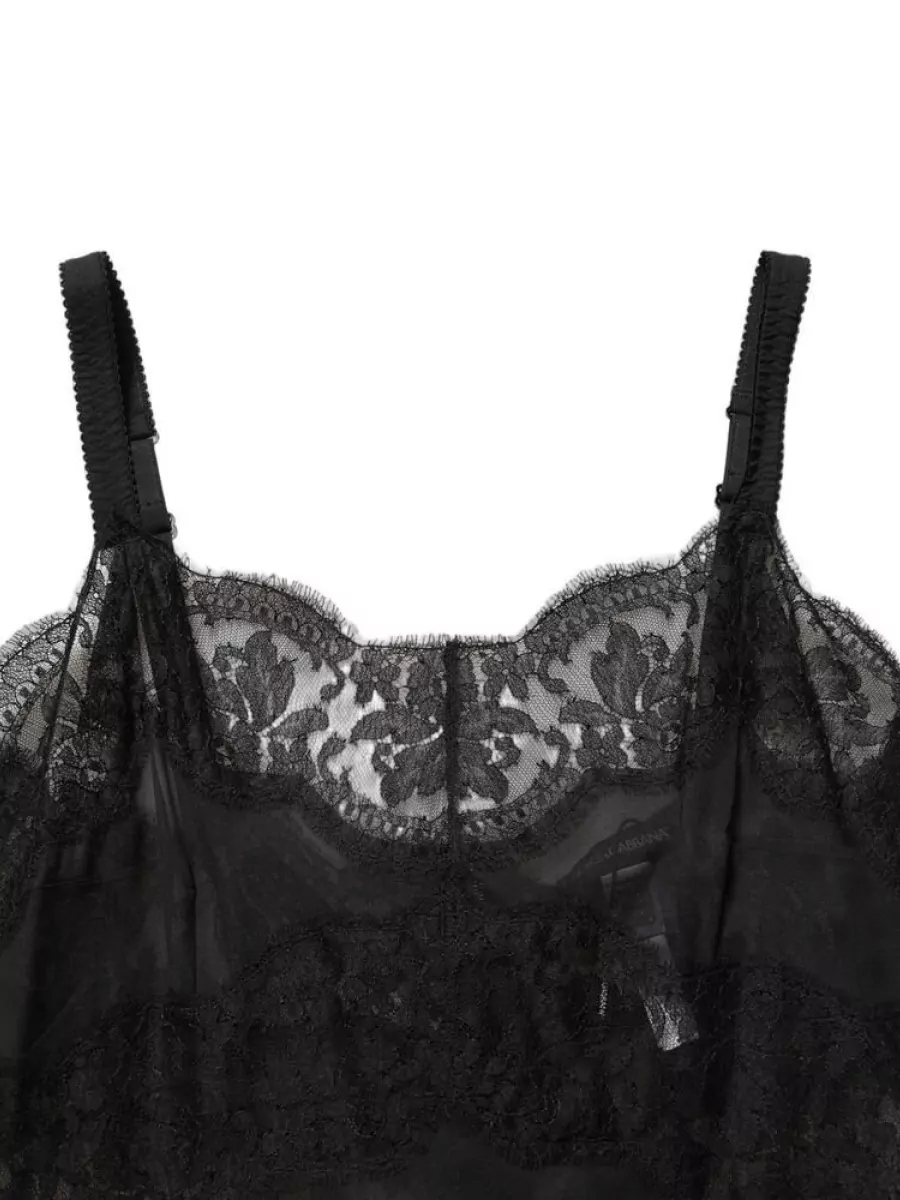Dolce&Gabbana Silk lace slip chemise — The metallic bronze mini slip mirrors the sock’s black-bronze sparkle and keeps the outfit clean, body-skimming and nightlife-focused without competing textures on the leg.