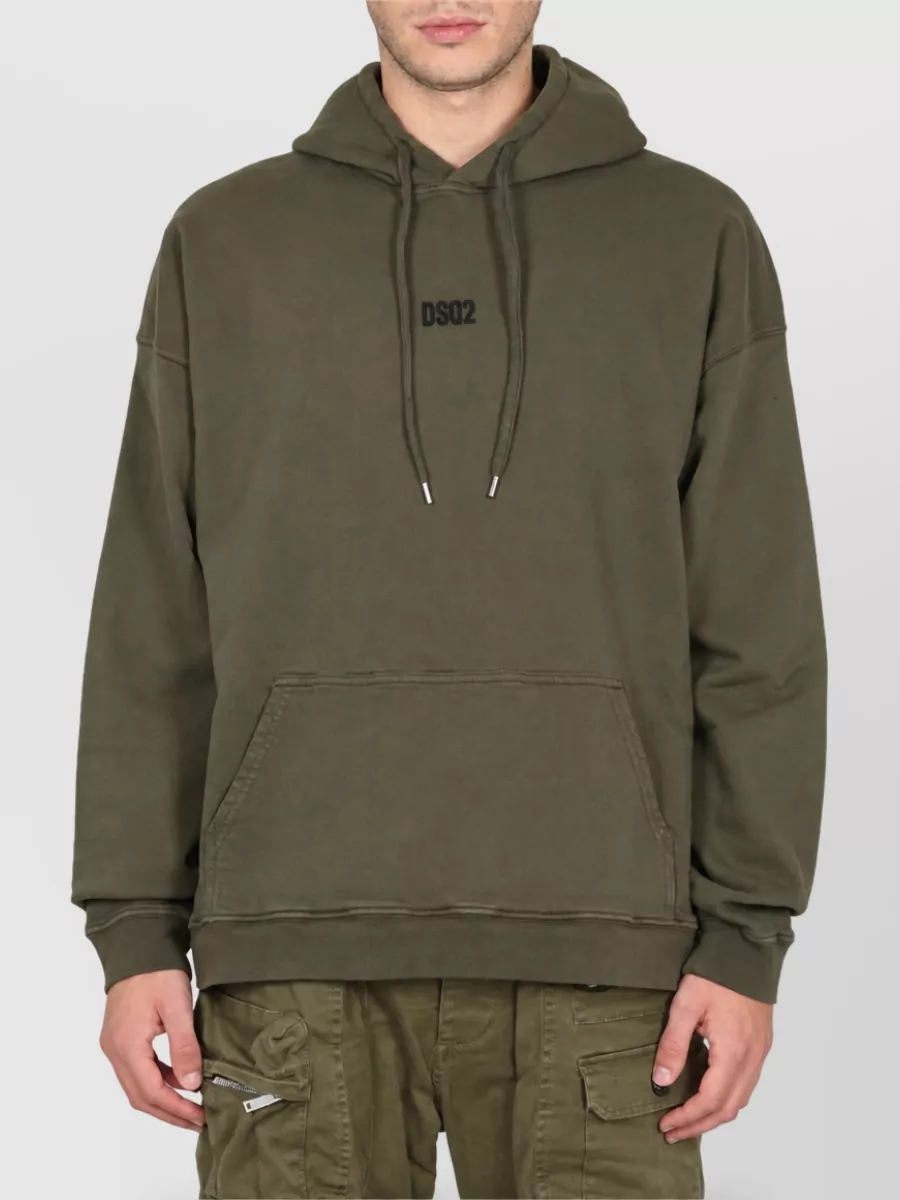 Dsquared2 Logo hoodie — The olive hoodie matches the trouser’s deep olive utility vibe and cropped straight leg, keeping the palette tight and the mood streetwear‑casual for cooler seasons.