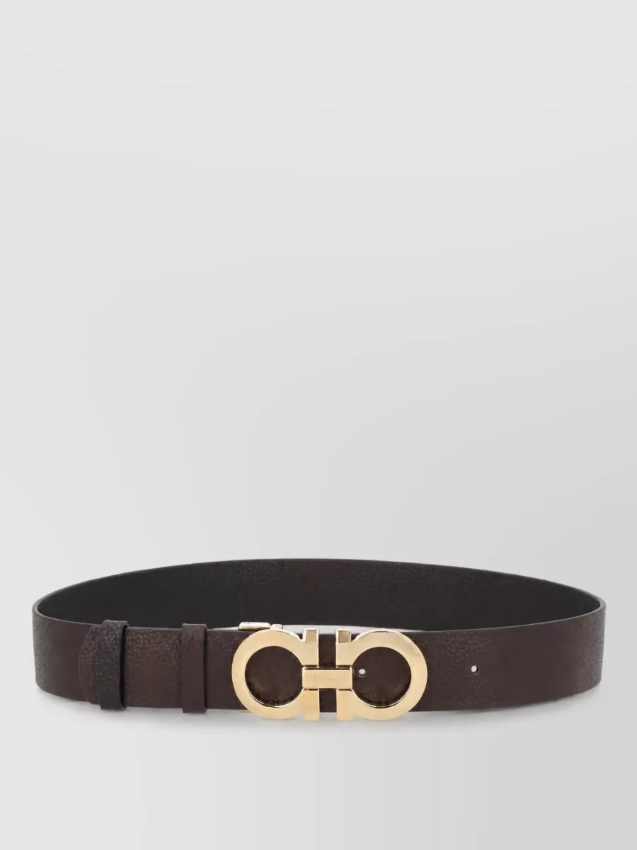 Ferragamo Leather reversible belt — The slim dark chocolate Ferragamo belt defines the already high waist in a tone that harmonizes with camel and black, adding subtle structure without interrupting the clean lines.
