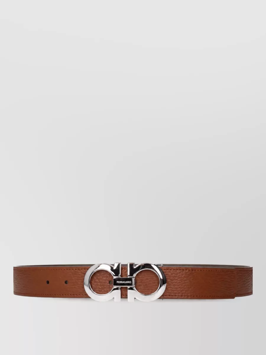Ferragamo Leather belt — The clean tan belt adds subtle structure at the waist, echoing the warm neutrals without introducing contrast that would break the calm tonal mood.