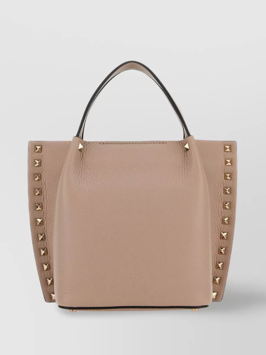 Shop Valentino Geometric Pattern Studded Leather Tote In Beige