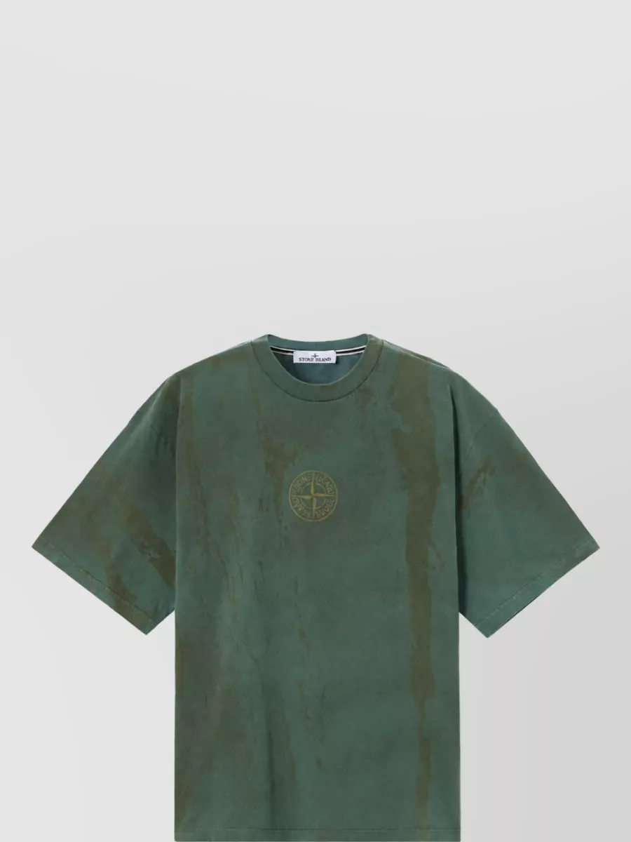 Stone Island Printed regular-fit cotton t-shirt — The washed olive Stone Island tee mirrors the short’s sun-faded feel and utility mood, creating a relaxed tonal contrast that stays sporty and cohesive in both palette and silhouette.
