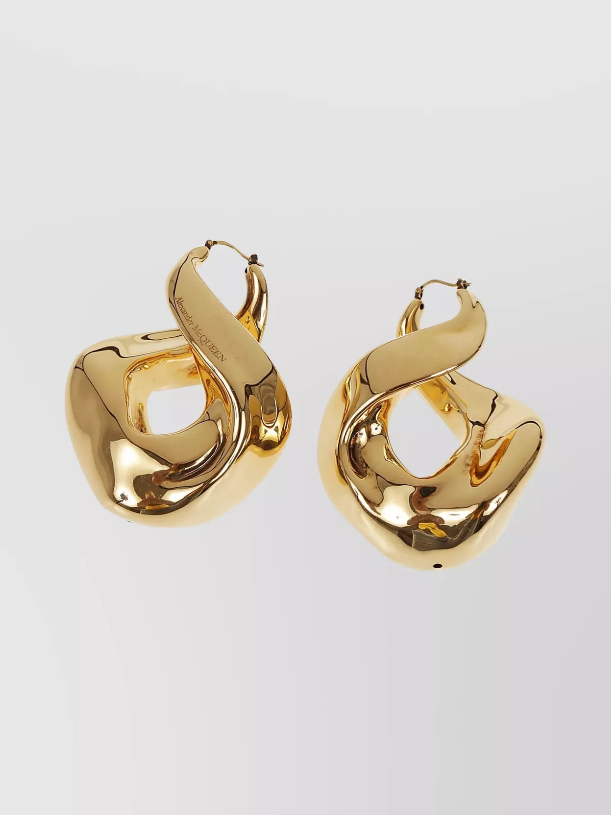 Shop Alexander Mcqueen Polished Brass Twisted Hoop Earrings In Brown