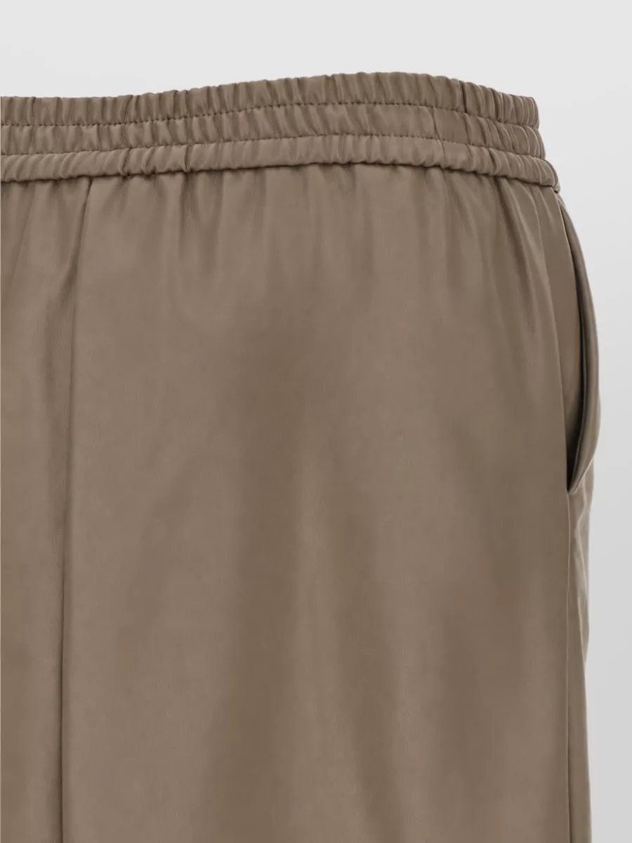 Nude high-rise trousers