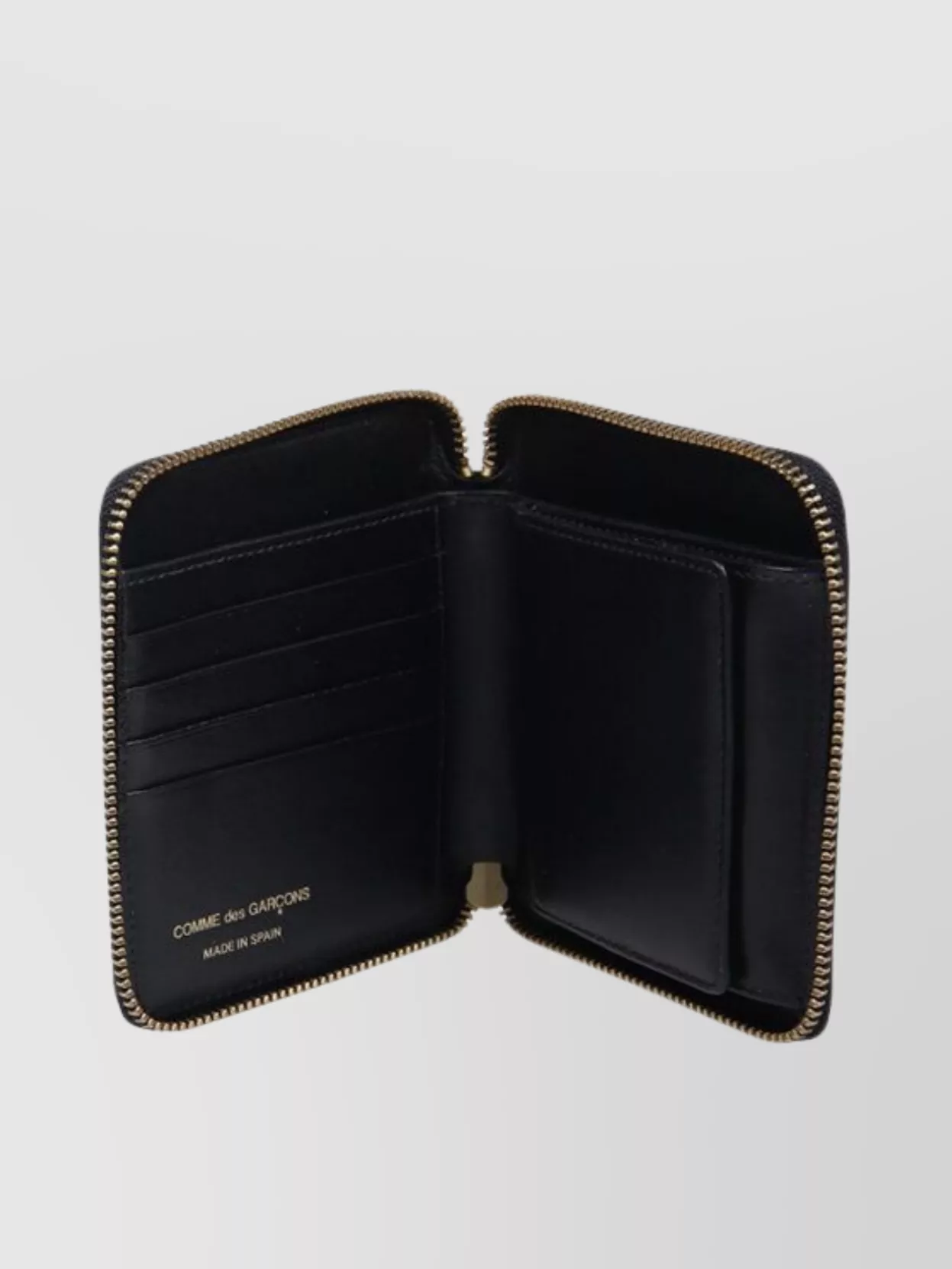 Comme Des Garçons Small Zip Around Wallet With Embossed Logotype In Black