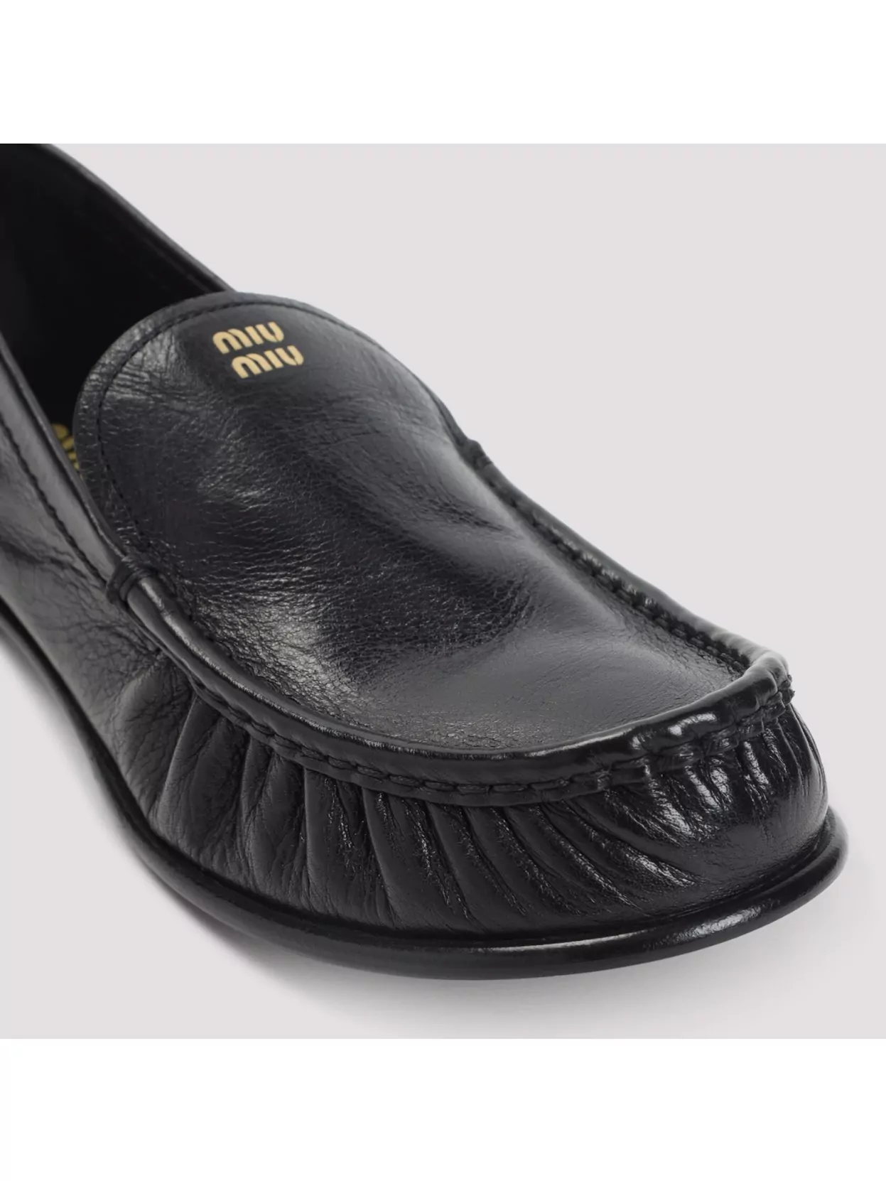 Miu Miu Loafers In Buffalo Leather With Embossed Stitching
