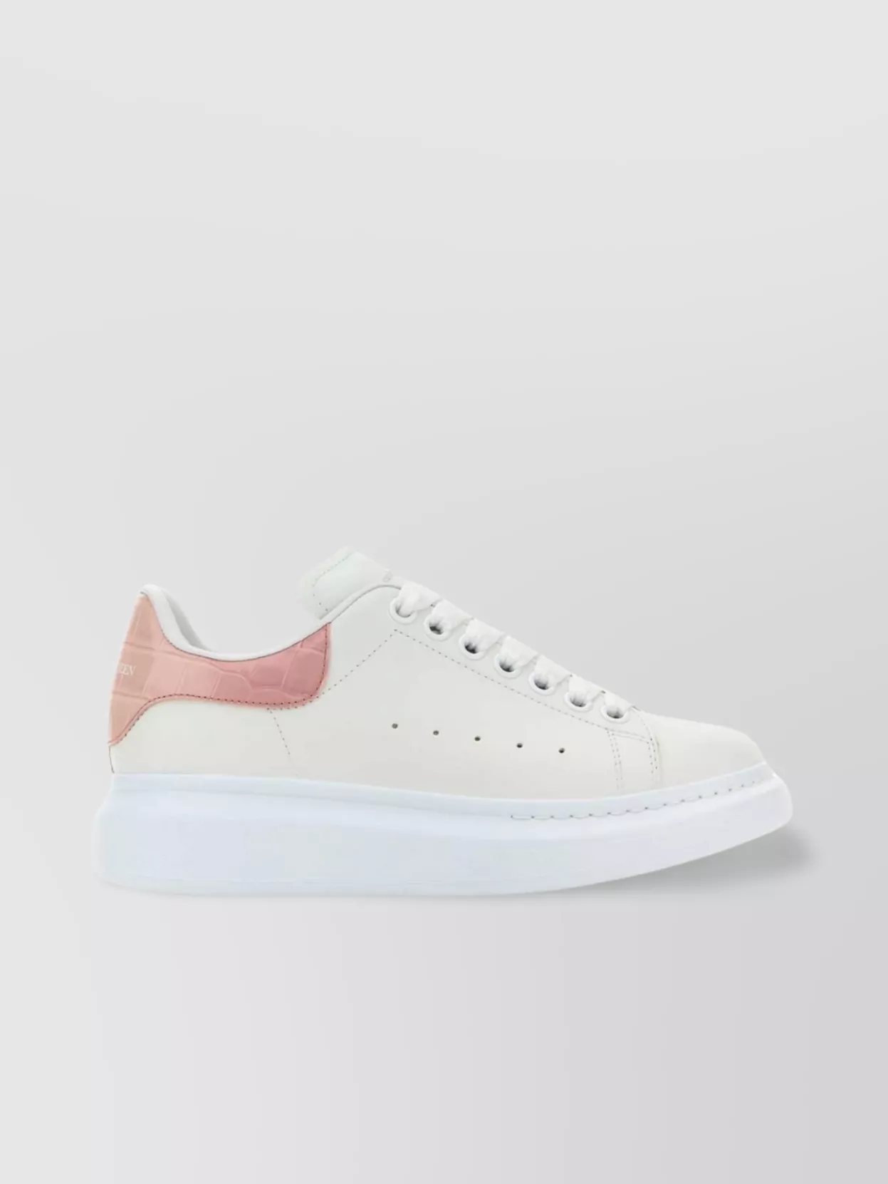 Shop Alexander Mcqueen Perforated Round Toe Sneakers In Grey