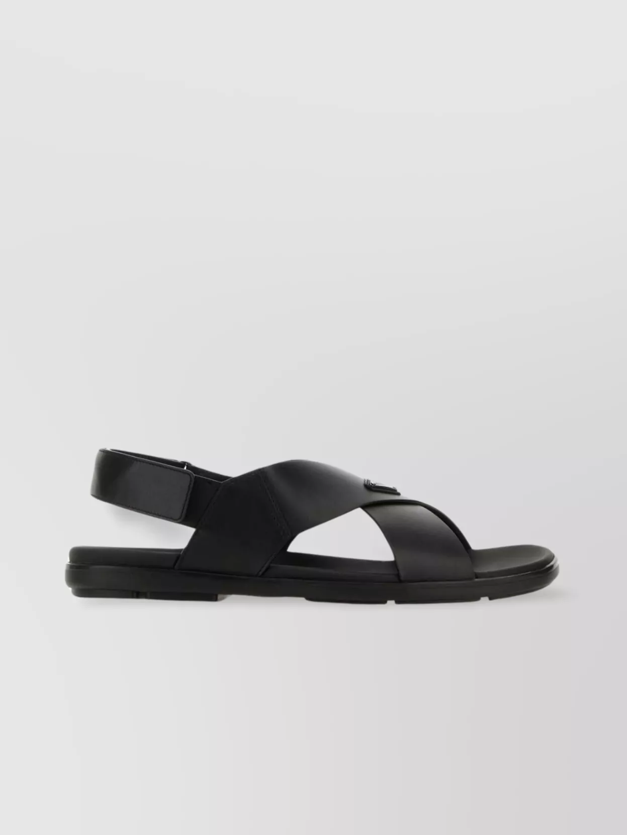 PRADA LEATHER SANDALS WITH FLAT SOLE AND CROSS-STRAP DESIGN