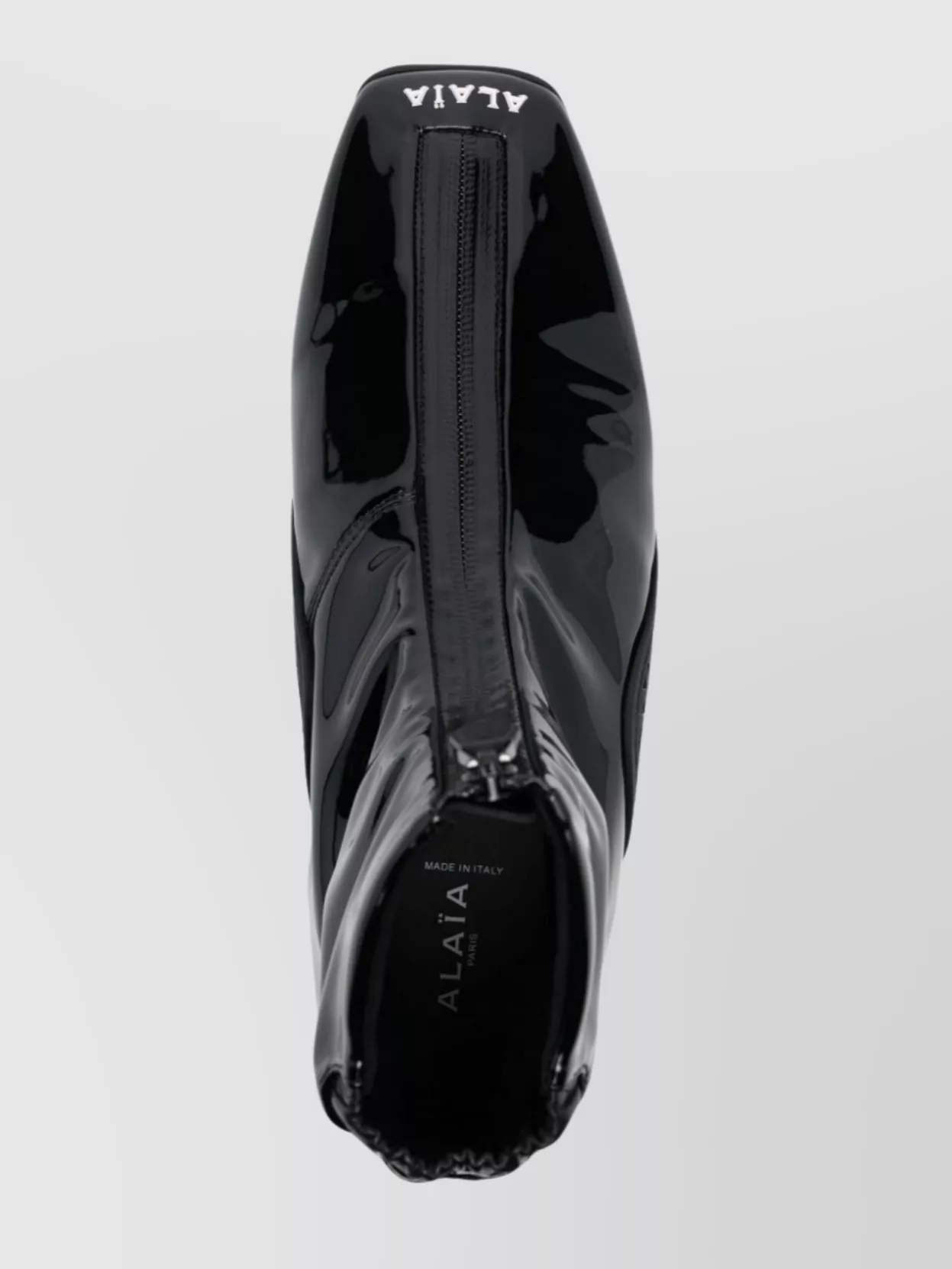 Shop Alaïa Stretch Patent Fabric Ankle Length Sneakers In Black