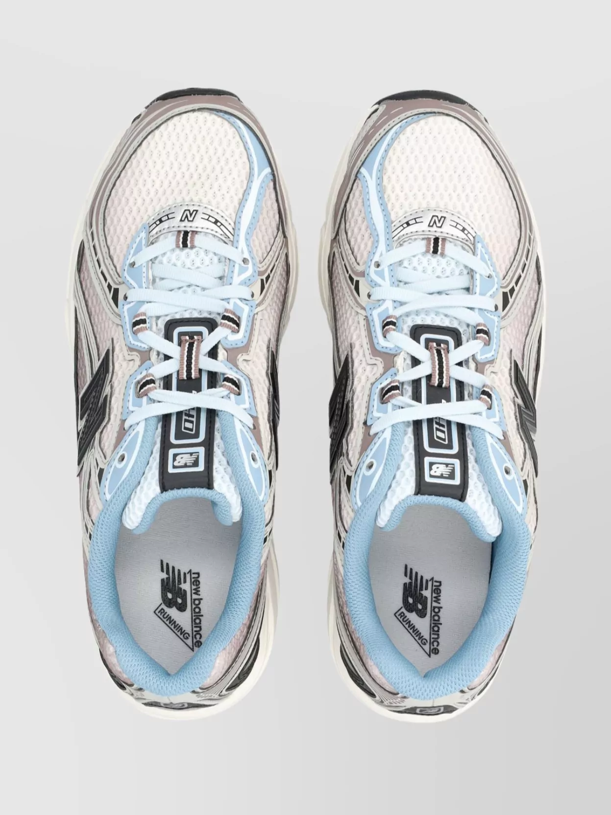 New Balance Modern Running Sneakers Featuring Angular Accents