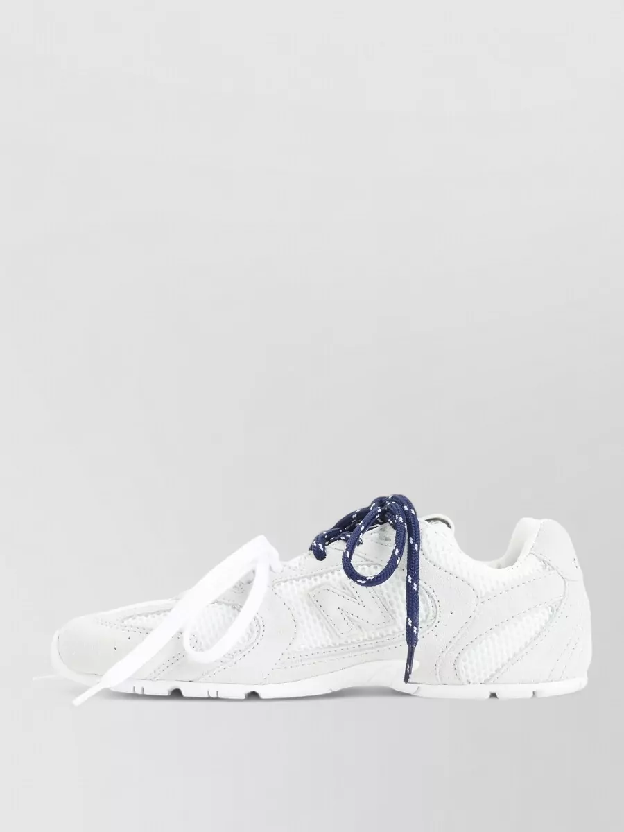 Miu Miu Stylish Sneakers With Unique Lacing Design